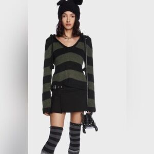 Minga London black and green striped, hooded, knit jumper.